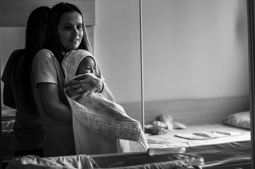 grayscale photo of woman in hijab